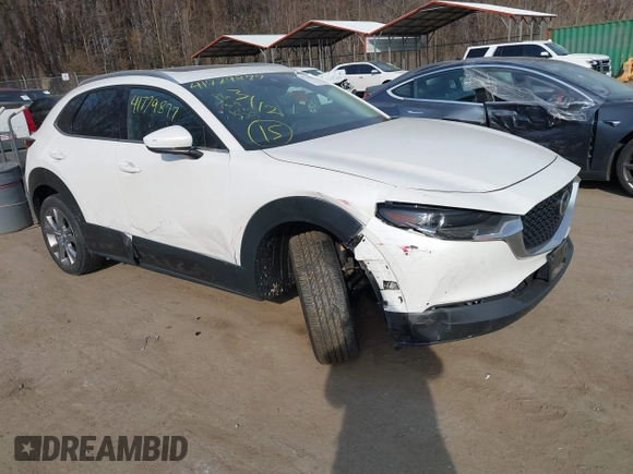 2022 Mazda CX-30 S Premium with VIN 3MVDMBDL7NM412263, listed as a IAAI auction lot 41779877 with 42,088 mi miles and . Bid and sale history available at carsss.com. Image 1.