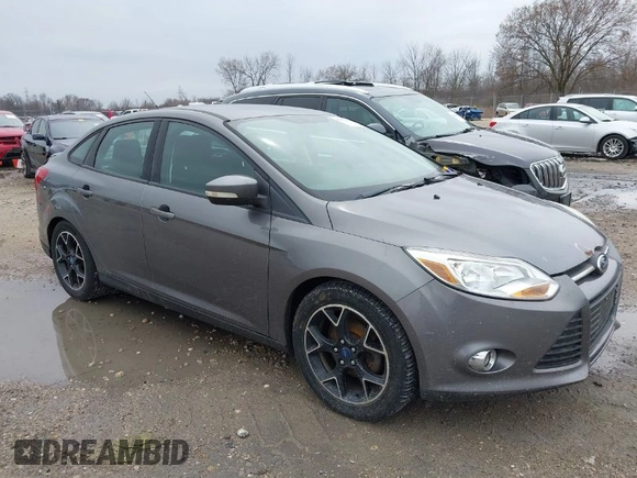 2012 Ford Focus SE with VIN 1FAHP3F21CL415006, listed as a IAAI auction lot 42073643 with 168,516 mi miles. Bid and sale history available at carsss.com. Image 1.