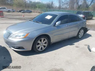 2013 Chrysler 200 Touring with VIN 1C3CCBBB4DN655936, listed as a IAAI auction lot 41963751 with 197,019 mi miles. Bid and sale history available at carsss.com. Image 2.