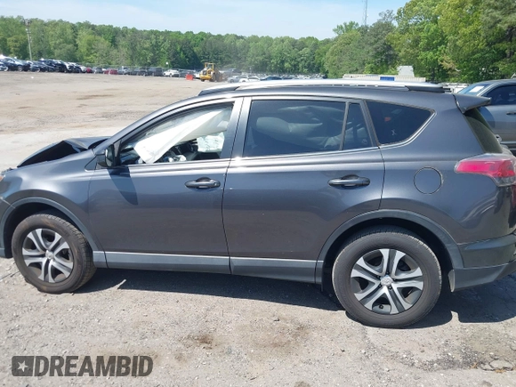 2016 Toyota RAV4 LE with VIN JTMZFREV7GJ086149, listed as a IAAI auction lot 42064251 with 90,104 mi miles and . Bid and sale history available at DreamBid. Image 14.