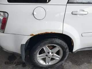 2005 Chevrolet Equinox LT z VIN 2CNDL73F856095869, wystawiony jako IAAI lot #42450905 z przebiegiem 145 307 mil mil oraz . Historia ofert i sprzedaży dostępna na DreamBid. Obrazek 6.