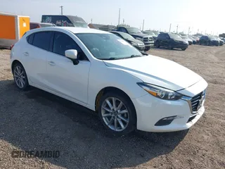 2017 Mazda 3 Touring with VIN 3MZBN1L77HM157118, listed as a IAAI auction lot 41734627 with 132,452 mi miles and . Bid and sale history available at DreamBid. Image 1.