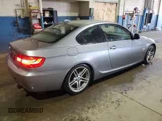 2011 BMW 3 Series 335is with VIN WBAKG1C56BE599457, listed as a Copart auction lot 52412655 with 134,497 mi miles and Clean title. Bid and sale history available at DreamBid. Image 3.