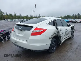 2010 Honda Crosstour EX-L z VIN 5J6TF2H55AL010444, wystawiony jako IAAI lot #42187788 z przebiegiem 217 940 mil mil oraz . Historia ofert i sprzedaży dostępna na DreamBid. Obrazek 4.