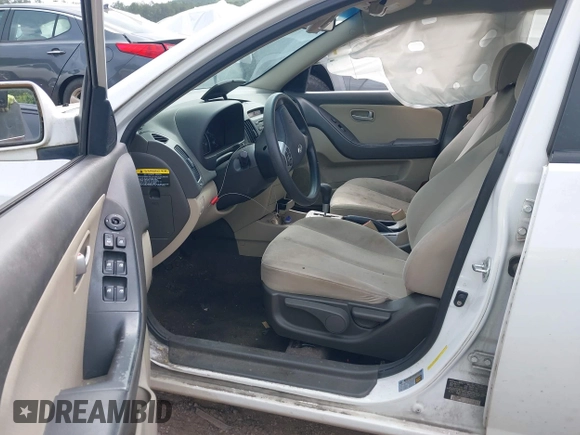 2009 Hyundai Elantra SE z VIN KMHDU46D49U595783, wystawiony jako IAAI lot #42206609 z przebiegiem 267 635 mil mil oraz . Historia ofert i sprzedaży dostępna na DreamBid. Obrazek 5.