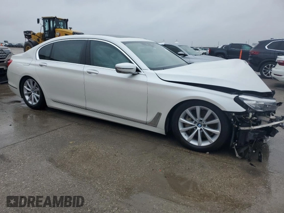 2017 BMW 7 Series 740i with VIN WBA7E2C55HG739366, listed as a Copart auction lot 45961575 with 0 mi miles and Salvage Title. Bid and sale history available at carsss.com. Image 4.