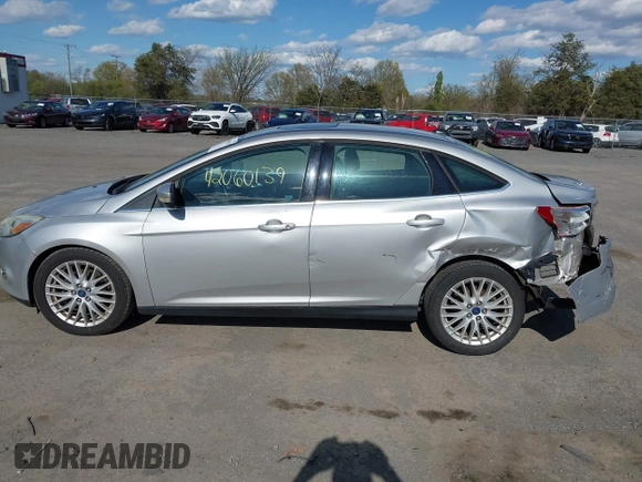 2012 Ford Focus SEL with VIN 1FAHP3H29CL151658, listed as a IAAI auction lot 42060139 with 149,547 mi miles and . Bid and sale history available at carsss.com. Image 14.