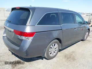 2014 Honda Odyssey EX-L with VIN 5FNRL5H67EB096027, listed as a IAAI auction lot 41950398 with 147,158 mi miles and . Bid and sale history available at DreamBid. Image 4.