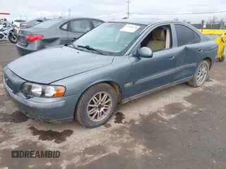 2001 Volvo S60 with VIN YV1RS61R412049879, listed as a IAAI auction lot 42010628 with 174,203 mi miles. Bid and sale history available at carsss.com. Image 2.
