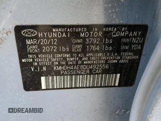 2013 Hyundai Elantra GLS z VIN KMHDH4AE8DU492556, wystawiony jako Copart lot #46315605 z przebiegiem 150 675 mil mil oraz Szkoda całkowita • Salvage title. Historia ofert i sprzedaży dostępna na DreamBid. Obrazek 14.