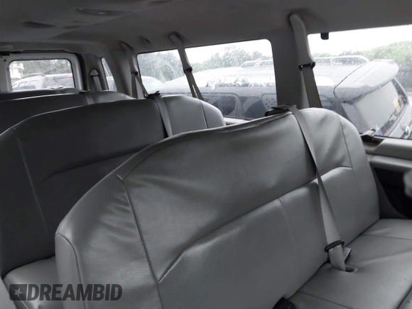 2009 Ford Econoline Passenger XL z VIN 1FBSS31L29DA07149, wystawiony jako IAAI lot #41863392 z przebiegiem 152 010 mil mil oraz . Historia ofert i sprzedaży dostępna na DreamBid. Obrazek 8.
