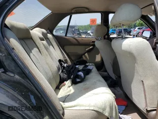 1994 Toyota Camry LE z VIN 4T1SK12E6RU408523, wystawiony jako Copart lot #56314665 z przebiegiem 221 867 mil mil oraz Szkoda całkowita • Salvage title. Historia ofert i sprzedaży dostępna na DreamBid. Obrazek 10.