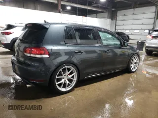2013 Volkswagen GTI с VIN WVWGD7AJXDW129840, выставлен на аукционе Copart как лот 52946845 с пробегом 118 520 миль миль и Списание • Salvage title. История ставок и продаж доступна на DreamBid. Изображение 3.