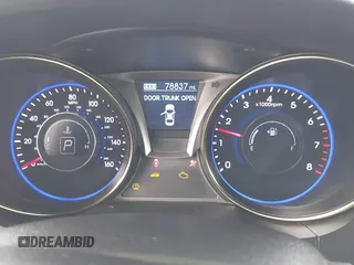 2013 Hyundai Genesis Coupe Premium z VIN KMHHT6KD0DU087180, wystawiony jako IAAI lot #42191739 z przebiegiem 78 837 mil mil oraz . Historia ofert i sprzedaży dostępna na DreamBid. Obrazek 7.