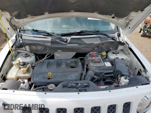 2014 Jeep Patriot Sport with VIN 1C4NJPBB2ED632251, listed as a Copart auction lot 60115685 with 192,268 mi miles and Salvage title. Bid and sale history available at DreamBid. Image 11.