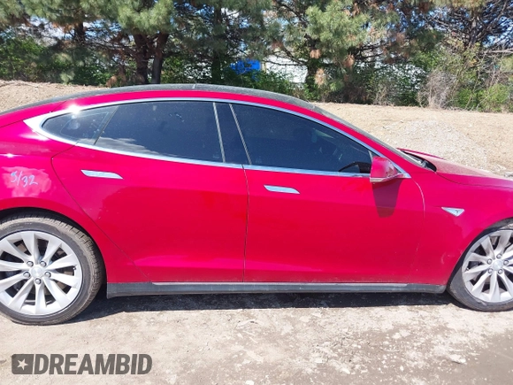 2014 Tesla Model S 60 with VIN 5YJSA1H11EFP37791, listed as a IAAI auction lot 41995504 with 84,371 mi miles and . Bid and sale history available at DreamBid. Image 13.