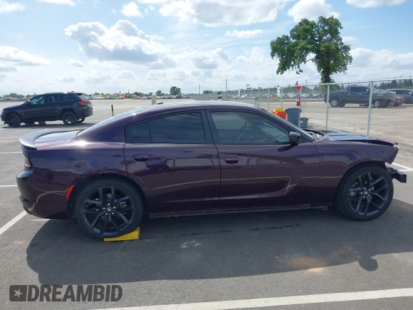2022 Dodge Charger SXT with VIN 2C3CDXBG4NH208748, listed as a IAAI auction lot 41916434 with 54,053 mi miles and . Bid and sale history available at DreamBid. Image 14.