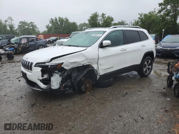2019 Jeep Cherokee Limited z VIN 1C4PJMDXXKD409564, wystawiony jako Copart lot #60893225 z przebiegiem 128 674 mil mil oraz Szkoda całkowita • Salvage title. Historia ofert i sprzedaży dostępna na DreamBid. Obrazek 1.