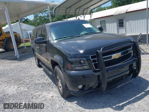 2007 Chevrolet Suburban LT z VIN 1GNFC160X7R218023, wystawiony jako IAAI lot #42305941 z przebiegiem 237 987 mil mil oraz . Historia ofert i sprzedaży dostępna na DreamBid. Obrazek 1.
