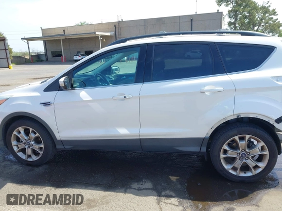2013 Ford Escape SEL with VIN 1FMCU0HX9DUD78203, listed as a IAAI auction lot 42022707 with 91,709 mi miles. Bid and sale history available at carsss.com. Image 15.