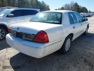 2007 Mercury Grand Marquis LS with VIN 2MEFM75V57X630666, listed as a IAAI auction lot 41791234 with 155,290 mi miles. Bid and sale history available at carsss.com. Image 4.