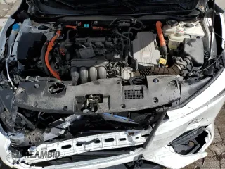 2019 Honda Insight Touring z VIN 19XZE4F9XKE007764, wystawiony jako Copart lot #54619275 z przebiegiem 24 441 mil mil oraz Szkoda całkowita • Salvage title. Historia ofert i sprzedaży dostępna na DreamBid. Obrazek 11.