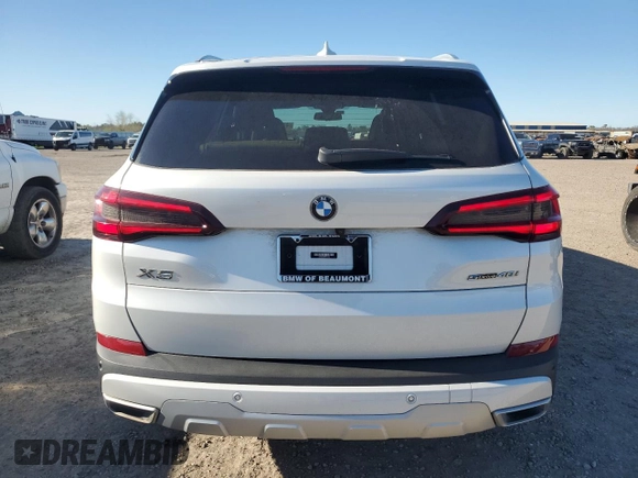 2022 BMW X5 sDrive40i with VIN 5UXCR4C07N9K91362, listed as a Copart auction lot 47933285 with 61,766 mi miles and Salvage Title. Bid and sale history available at carsss.com. Image 6.