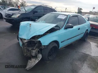 1998 Honda Civic HX with VIN 1HGEJ7127WL127977, listed as a IAAI auction lot 41230187 with 182,000 mi miles. Bid and sale history available at carsss.com. Image 2.