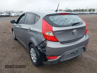 2014 Hyundai Accent GS with VIN KMHCT5AE3EU176306, listed as a IAAI auction lot 41572325 with 179,277 mi miles and . Bid and sale history available at carsss.com. Image 6.