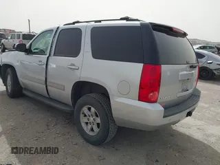2014 GMC Yukon SLT with VIN 1GKS1CE02ER204452, listed as a IAAI auction lot 41804400 with 176,265 mi miles. Bid and sale history available at carsss.com. Image 3.