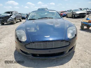 2007 Aston Martin DB9 z VIN SCFAD02A57GB08568, wystawiony jako Copart lot #57238375 z przebiegiem 41 255 mil mil oraz Tytuł czysty. Historia ofert i sprzedaży dostępna na DreamBid. Obrazek 5.