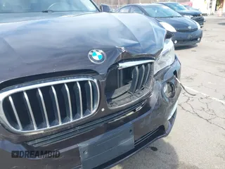 2014 BMW X5 xDrive35i with VIN 5UXKR0C57E0H20944, listed as a IAAI auction lot 42011451 with 208,205 mi miles. Bid and sale history available at carsss.com. Image 17.