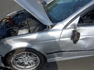2000 BMW M5 z VIN WBSDE9349YBZ96946, wystawiony jako IAAI lot #42043141 z przebiegiem 107 000 mil mil oraz . Historia ofert i sprzedaży dostępna na DreamBid. Obrazek 12.