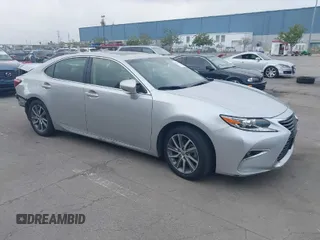2016 Lexus ES 300h with VIN JTHBW1GG6G2118339, listed as a IAAI auction lot 41910352 with 73,184 mi miles and . Bid and sale history available at DreamBid. Image 1.