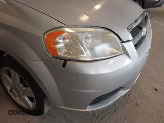 2008 Chevrolet Aveo LS with VIN KL1TD56618B064257, listed as a IAAI auction lot 42299398 with 158,877 mi miles and . Bid and sale history available at DreamBid. Image 6.