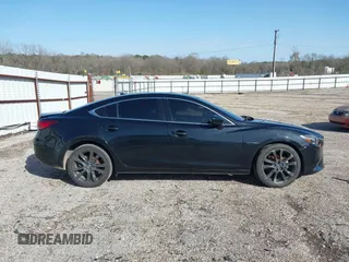 2016 Mazda 6 i Grand Touring with VIN JM1GJ1W50G1478699, listed as a IAAI auction lot 41711211 with 208,720 mi miles and . Bid and sale history available at DreamBid. Image 14.