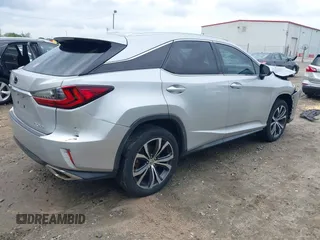 2016 Lexus RX 350 z VIN 2T2ZZMCA5GC002315, wystawiony jako IAAI lot #42107312 z przebiegiem 156 339 mil mil oraz . Historia ofert i sprzedaży dostępna na DreamBid. Obrazek 4.