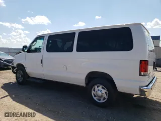 2014 Ford Econoline Wagon XL with VIN 1FBNE3BL2EDA82379, listed as a Copart auction lot 61391474 with 77,151 mi miles and Salvage Title. Bid and sale history available at carsss.com. Image 2.