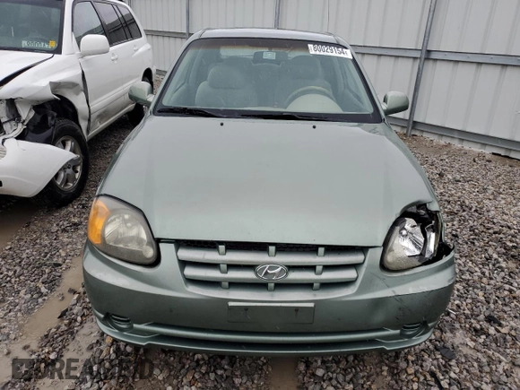 2003 Hyundai Accent GL with VIN KMHCG35C23U264701, listed as a Copart auction lot 80029154 with 142,090 mi miles and Salvage Title. Bid and sale history available at carsss.com. Image 5.