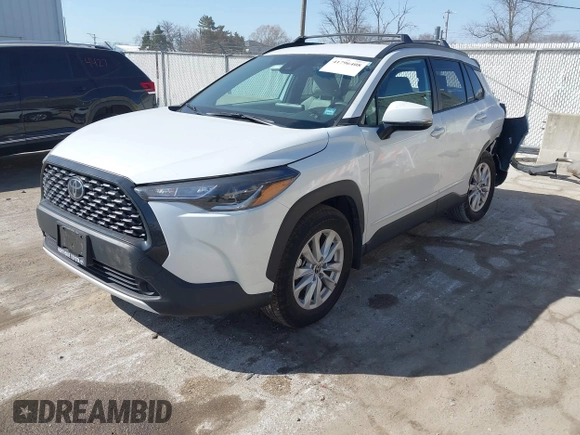 2022 Toyota Corolla Cross LE with VIN 7MUCAABG7NV013235, listed as a IAAI auction lot 41796408 with 20,943 mi miles and . Bid and sale history available at DreamBid. Image 18.