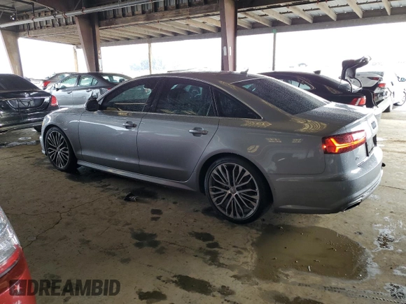 2016 Audi A6 2.0T Premium Plus with VIN WAUDFAFC9GN181665, listed as a Copart auction lot 82180044 with 77,038 mi miles and Salvage Title. Bid and sale history available at carsss.com. Image 2.
