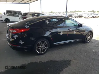 2013 Kia Optima SX с VIN 5XXGR4A65DG190896, выставлен на аукционе Copart как лот 59630485 с пробегом 136 385 миль миль и Списание • Salvage title. История ставок и продаж доступна на DreamBid. Изображение 3.