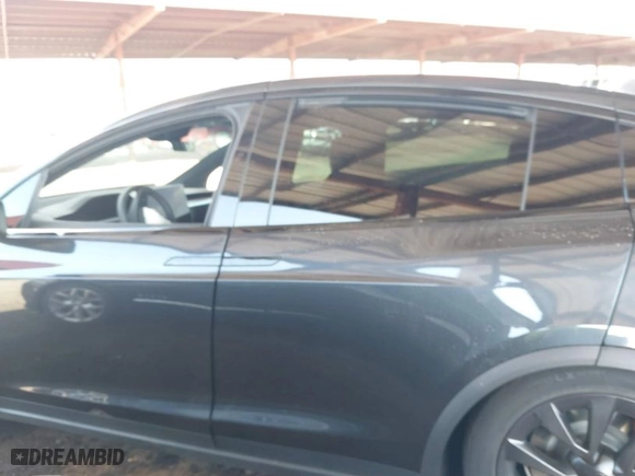 2024 Tesla Model X Plaid with VIN 7SAXCBE60RF447105, listed as a IAAI auction lot 41355592 with NaN miles. Bid and sale history available at carsss.com. Image 15.