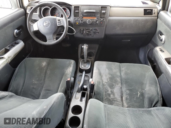 2011 Nissan Versa S with VIN 3N1BC1AP3BL404551, listed as a Copart auction lot 51977085 with 207,070 mi miles and Salvage title. Bid and sale history available at DreamBid. Image 8.