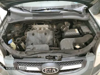 2009 Kia Sportage LX with VIN KNDJE723X97561560, listed as a Copart auction lot 49766995 with 130,623 mi miles and Salvage Title. Bid and sale history available at DreamBid. Image 12.