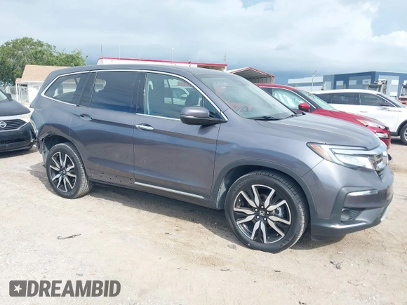 2022 Honda Pilot Elite with VIN 5FNYF6H04NB025212, listed as a IAAI auction lot 42430032 with 69,427 mi miles and . Bid and sale history available at DreamBid. Image 1.