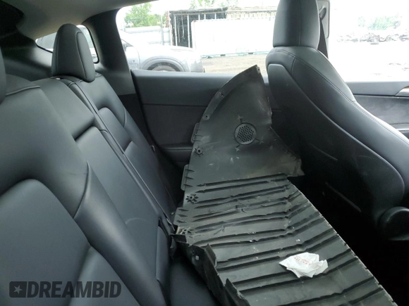 2024 Tesla Model Y Long Range с VIN 7SAYGDEE6RF128495, выставлен на аукционе Copart как лот 61127095 с пробегом Не указан миль и Списание • Salvage title. История ставок и продаж доступна на DreamBid. Изображение 10.