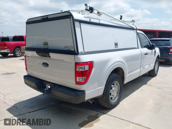 2021 Ford F-150 XL with VIN 1FTMF1CB2MKD85770, listed as a IAAI auction lot 42175883 with 129,366 mi miles and . Bid and sale history available at DreamBid. Image 4.