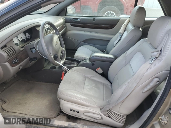 2004 Chrysler Sebring Limited z VIN 1C3EL65R14N257513, wystawiony jako Copart lot #84049844 z przebiegiem 82 402 mil mil oraz Szkoda całkowita • Salvage title. Historia ofert i sprzedaży dostępna na DreamBid. Obrazek 7.