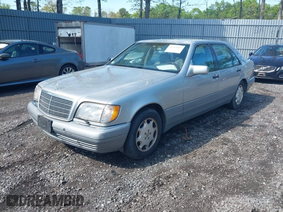 1995 Mercedes-Benz S z VIN WDBGA43E0SA254443, wystawiony jako IAAI lot #42168405 z przebiegiem 88 156 mil mil oraz . Historia ofert i sprzedaży dostępna na DreamBid. Obrazek 2.